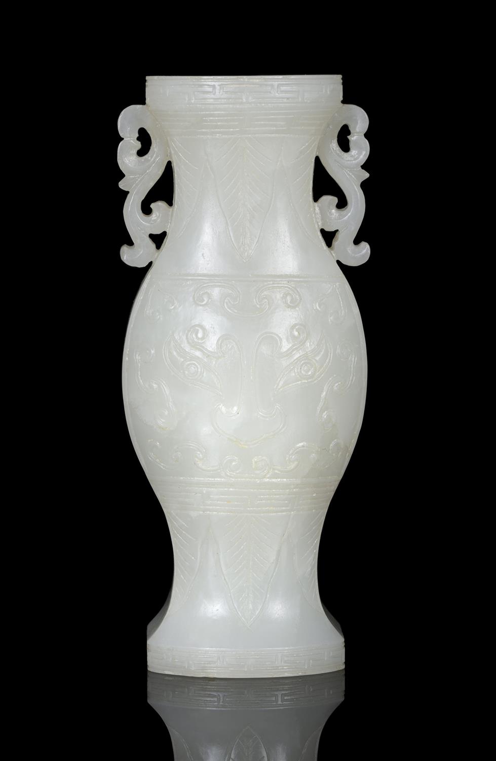 A WHITE JADE ‘TAOTIE MASK’ JOYSTICK HOLDER OF ARCHAISTIC GU SHAPE CHINA, QING DYNASTY Of - Image 2 of 9