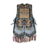 A EMBROIDERED SILK XIAPE OR COURT WAISTCOAT CHINA, QING DYNASTY, 19TH CENTURY Made of dark night