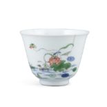 A FAMILLE VERTE 'MONTH' CUP WITH KANGXI MARK BUT LATER The cup is delicately potted with flaring