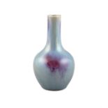 A FLAMBE / TRANSMUTATION GLAZED PORCELAIN BOTTLE VASE CHINA, QING DYNASTY It has a compressed