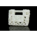 A JADE ‘KUI DRAGONS AND LOTUS’ PADLOCK / PLAQUE / PENDANT CHINA, QING DYNASTY Of rectangular