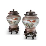 A PAIR OF IMARI PALETTE ‘HUNDRED BOYS’ PORCELAIN JARS CHINA, QING DYNASTY With a waisted lower
