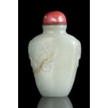 PROPERTIES FROM A NOTED COLLECTION OF JADES AND SNUFFBOTTLES *A WHITE JADE ‘PLUM FLOWER’ SNUFF