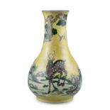 A PORCELAIN ‘DEER’ VASE OF ARCHAISTIC HU SHAPE ARTEMISIA LEAF MARK CHINA, LATE QING DYNASTY, 19TH