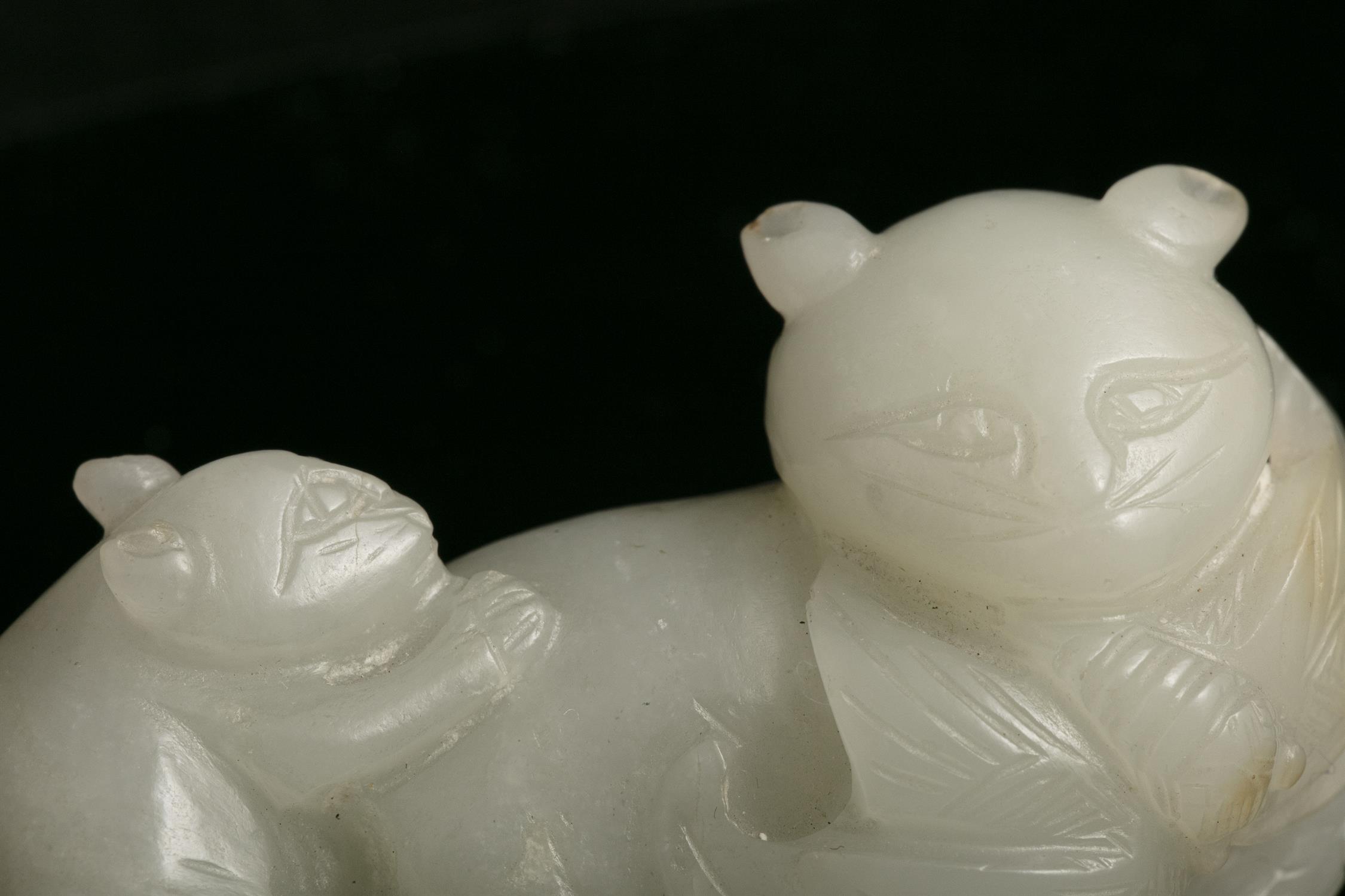 A WHITE JADE GROUP OF TWO CATS WITH A BUTTERFLY 玉耄耋 CHINA, POSSIBLY QING DYNASTY Carved out of an - Image 2 of 20