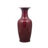 A LARGE FLAMBE / OXBLOOD GLAZED PORCELAIN PHOENIX-TAIL VASE, FENGWEIZUN CHINA, POSSIBLY LATE QING