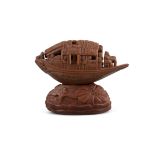 AN OLIVE PIT CARVING OF A 'PLEASURE BOAT' IN THE MANNER OF GUCHENG 谷生作 China, Late Qing Dynasty to