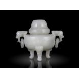 PROPERTIES FROM A NOTED COLLECTION OF JADES AND SNUFFBOTTLES *A WHITE JADE TRIPOD CENSER OR