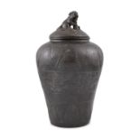 *A BRONZE URN AND COVER CHINA, MODERN, YUAN STYLE Of elongated egg-shaped body and topped by a