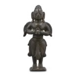 A SMALL BRONZE SCULPTURE OF AN HINDU GOD INDIA, 19TH TO 20TH CENTURY Cast of plain bronze, covered