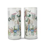 A MIRROR PAIR OF SHUICAI ‘SHOULAO AND BOYS’ PORCELAIN HAT HOLDERS China, Circa 1900s-1920s Each