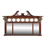 A MAHOGANY AND PARCEL GILT DECORATED RECTANGULAR OVERMANTLE MIRROR, with swan-neck pediment above a
