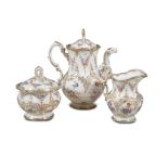 A MEISSEN TEASET, 19th Century, moulded and decorated with sprays and swags of lowers, and gilded,