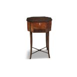 A GEORGE III OCTAGONAL SEWING TABLE, with hinged cover and fitted with a frieze drawer,