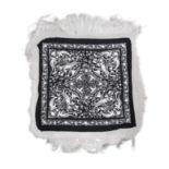 A FINE CHINESE BLACK AND WHITE EMBROIDERY, of squared shape decorated with phoenix birds, peonies,