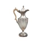 A GEORGE IV SILVER CLARET JUG, London c.1788, mark of 'I K', the fluted body with bright-cut