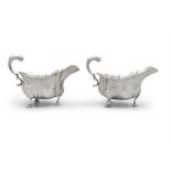 A PAIR OF VICTORIAN SILVER SAUCEBOATS, London c.1898, mark of D & J Welby, with fluted bodies and