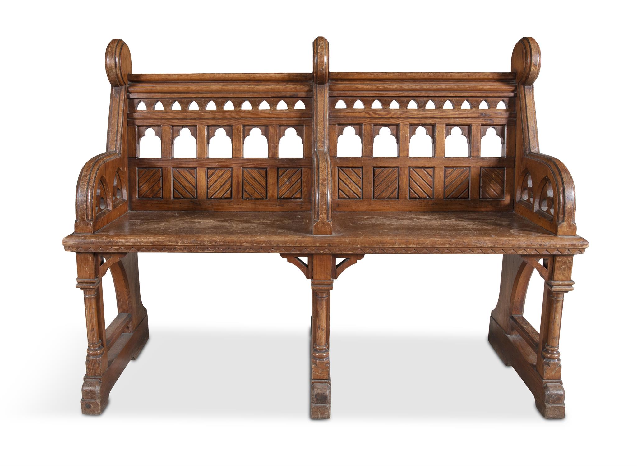 A 19TH CENTURY OAK BENCH, in the manner of Pugin, the rectangular back pierced and carved with