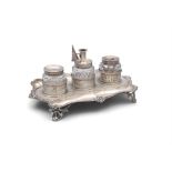 A GEORGE III SILVER INKSTAND, London c.1775, mark of William Plummer, of shaped rectangular form,