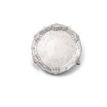 A GEORGE III IRISH SILVER CARD TRAY, Dublin c.1770s, mark of 'WH', of circular form with raised