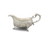 A LARGE GEORGE III IRISH SILVER SAUCEBOAT, Dublin, maker's mark 'SW', of helmet form,