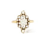 AN EARLY 20TH CENTURY DIAMOND DRESS RING, CIRCA 1900 Centring an old cushion-shaped diamond of