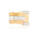 A RETRO DIAMOND DRESS RING, CIRCA 1940 Of odeonesque design, set with a row of old brilliant-cut