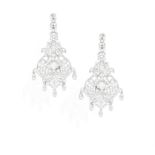 A PAIR OF DIAMOND PENDENT EARRINGS, CIRCA 1950 The openwork chandeliers with foliate scrolls and