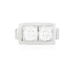 A DIAMOND TWO-STONE RING, CIRCA 1940 Set with two old brilliant-cut diamonds in a rectangular