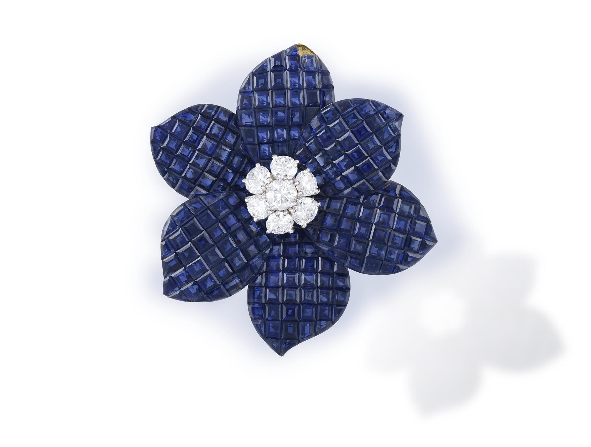 A RARE & COLLECTIBLE MYSTERY-SET SAPPHIRE AND DIAMOND FLOWER BROOCH, BY VAN CLEEF & ARPELS The