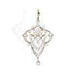 AN EARLY 20TH CENTURY DIAMOND PENDANT, CIRCA 1900 Of openwork, scrolling design set with set