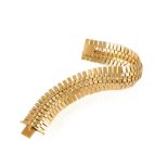 A GOLD BRACELET, FRENCH, CIRCA 1955 The highly articulated polished open-link strap, in 18K gold,