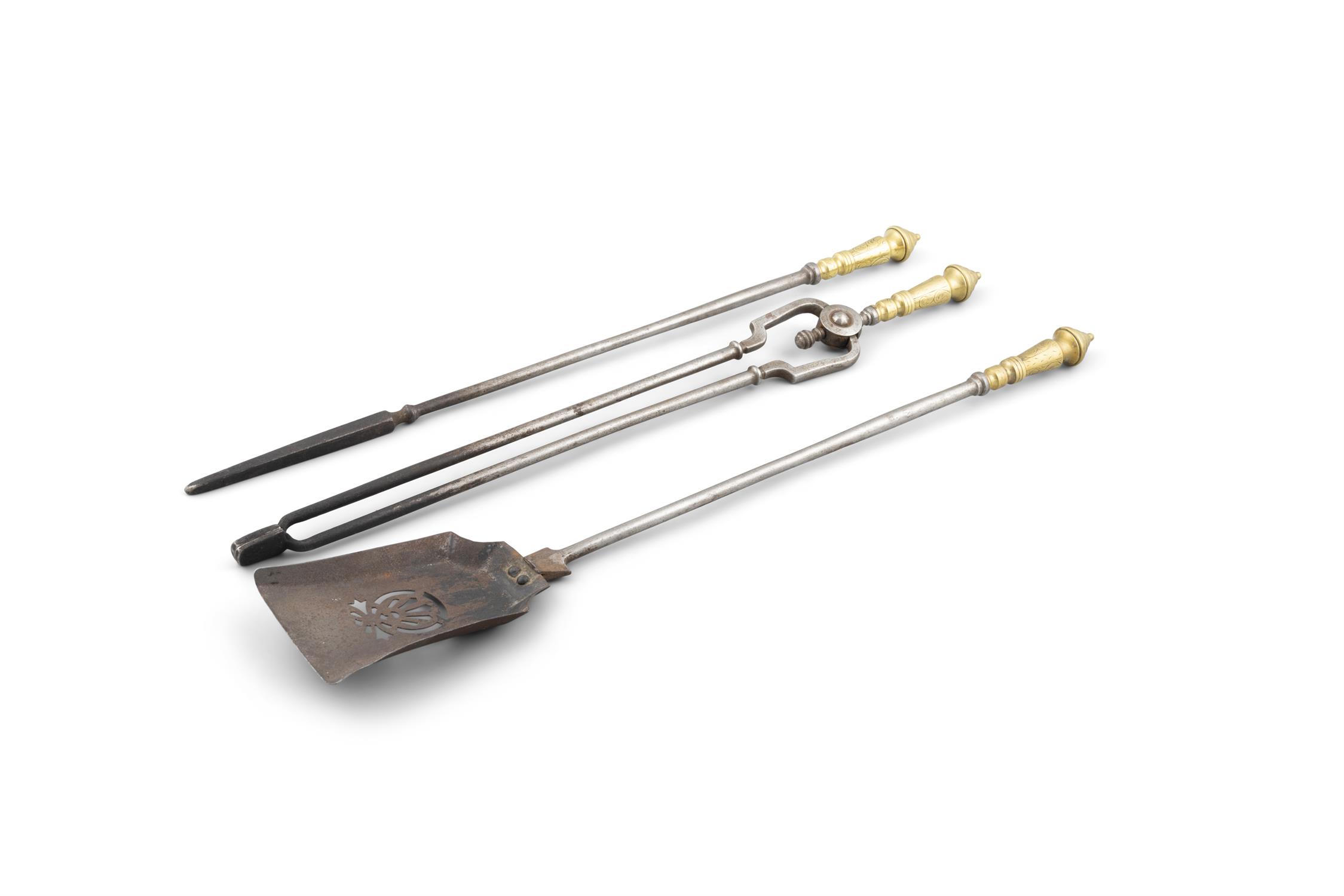 A SET OF 18TH CENTURY BRASS AND STEEL FIRE IRONS, comprising a shovel, poker and tongs,