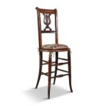 A 19TH CENTURY FRUITWOOD CHILDS HIGH BACK CHAIR, the rail back above a lyre shaped splat raised on