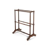 A CLOTHES HORSE / TOWEL RAIL, of upright rectangular form with two tiers of turned twin rails,