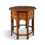 A 19TH CENTURY MIDDLE-EASTERN WALNUT OCTAGONAL CENTRE TABLE, profusely decorated with brass and