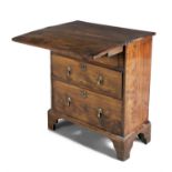 AN 18TH CENTURY STAINED ELM BACHELORS CHEST, THE FOLDING TOP ABOVE SUPPORTING SLIDES,