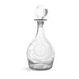 A PLAIN BLOWN FULL SIZE DECANTER c.1800, engraved with a wreath filled with hatching and garlanded