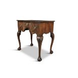 A GEORGE II WALNUT LOW BOY, the crossbanded rectangular top above central short cross banded drawer