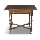 A WILLIAM AND MARY STYLE STAINED OAK SIDE TABLE, the overhanging plain top with moulded rim above a