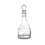 A FULL-SIZE PLAIN BLOWN DECANTER c.1800, with two neck rings, the body engraved 'Madeira' within a