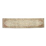A TABRIZ CREAM RUNNER, the central field woven with scattered flowers and two medallions,