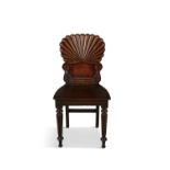 A GEORGE IV MAHOGANY HALL CHAIR, with lobed fan shaped back, panelled seat on octagonal tapering