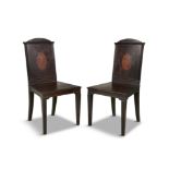 A PAIR OF GEORGE III INLAID MAHOGANY HALL CHAIRS, the rectangular panel backs with semi elliptical