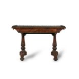 A WILLIAM IV ROSEWOOD WRITING TABLE, c.1835, with three-quarter cast brass gallery fitted with