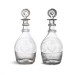 AN EXCEPTIONAL PAIR OF OVOID 'THE LAND WE LIVE IN' FULL SIZE DECANTERS c.1800, attributed to