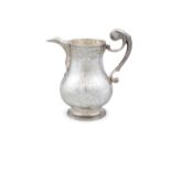 A RARE IRISH SILVER BEER JUG, Dublin c.1734, probably by Thomas Walker, the banded rim continuing