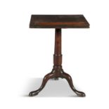AN EARLY 19TH CENTURY MAHOGANY READING STAND, the hinged top lifting on a rachet,