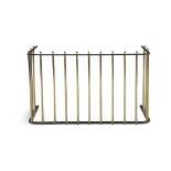 A REGENCY IRON AND BRASS NURSERY FENDER, with iron rail top. 120cm wide, 46cm high