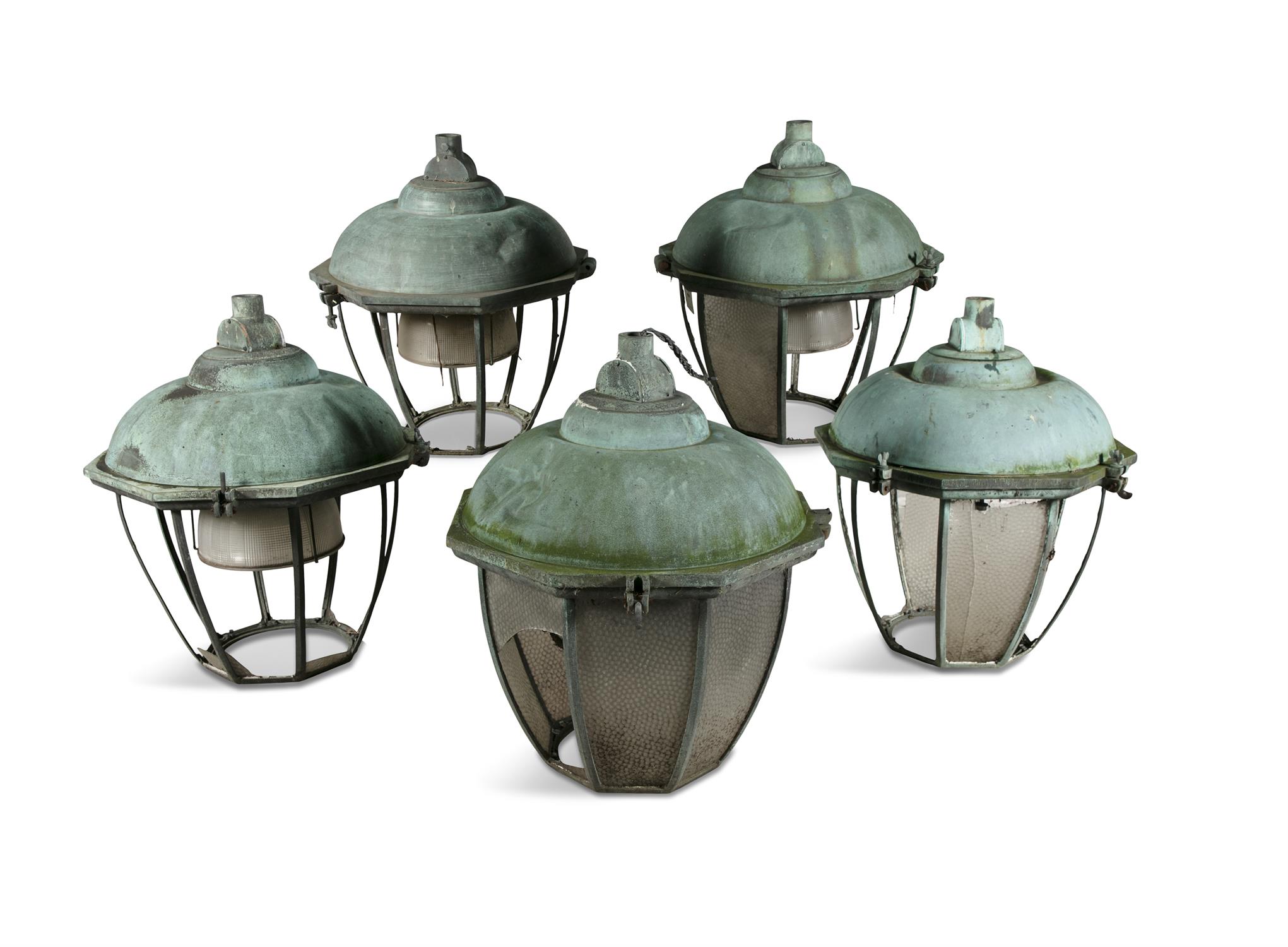 A SET OF FIVE BRONZE LANTERNS, of octagonal tapering design. 77cm high Provenance: formerly